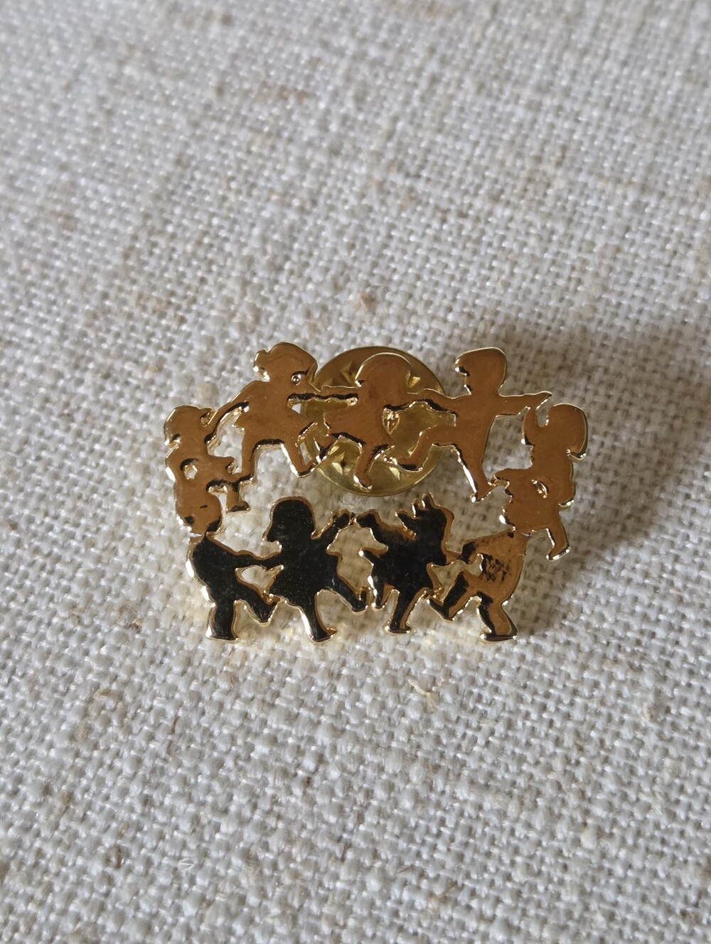 Gold Tone Lapel Pin Signed TPM CIRCLE of Children Holding Hands